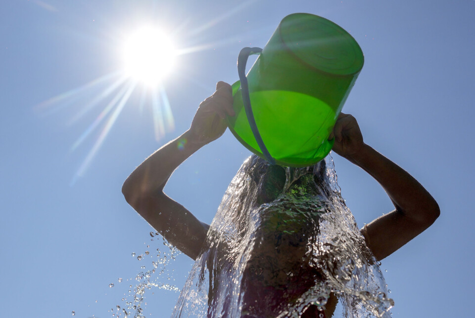 Det varme sommarvêret har festa eit klamt grep om landet, og det skal ikkje sleppa tak med det første. Foto: Javad Parsa/NTB/NPK.